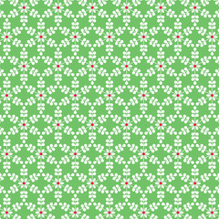 white snowflake pattern on green