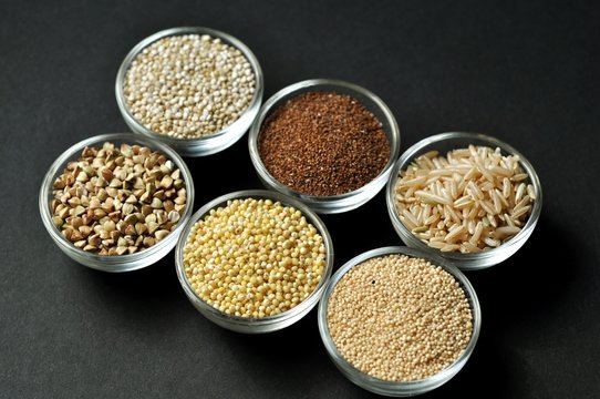 Gluten-free grains on black background