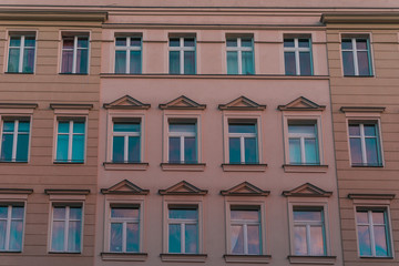 Fototapeta premium Stylish neo-classical type windows on apartments