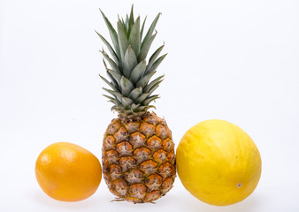 Assortment of fresh exotic fruits isolated on white