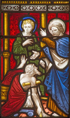ROME, ITALY - MARCH 9. 2016: The Saints Peter and John Healing the Lame Man on the stained glass of All Saints' Anglican Church by workroom Clayton and Hall (19. cent.)