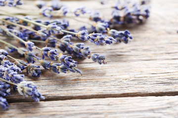 Obraz na płótnie Canvas Bunch of lavender flowers on grey wooden background