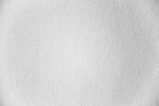 Extreme macro image of smooth white paper background texture
