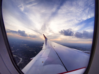 Fototapeta na wymiar Airplane travel time is sunset.