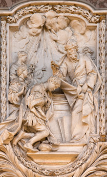 ROME, ITALY - MARCH 10, 2016: The relief of The Baptism of the Eunuch from life of St. Philip the Apostle in church Basilica di San Marco by Carlo Monaldi (1741).