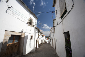 Street of the Jewish quarter, town of Valencia de Alcantara, province of Caceres, autonomous community of Extremadura, southwestern Spain - obrazy, fototapety, plakaty