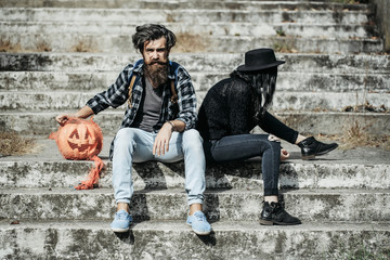 Fototapeta na wymiar halloween couple with pumpkin