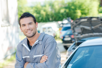 Mechanic wearing overalls
