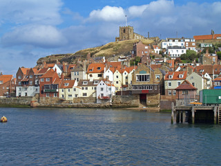 Harbor and skyline in the popular fishing port of Whitby, North Yorkshire, England