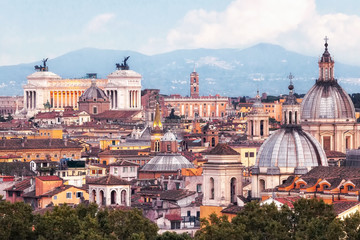 Fototapeta premium Panoramic view of the city of Rome, Italy. The roofs of the houses, the domes of the churches and in the background the monumental Vittoriano, one of the symbols of the capital.