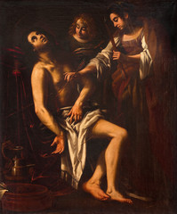 ROME, ITALY - MARCH 12, 2016: The painting of death of St. Sebastian in church Basilica di Santi Quattro Coronati by Giovanni Baglione (1566 - 1643).