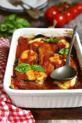 Traditional italian dish parmigiana with eggplants.
