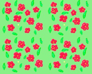 On a green background red flowers with green leaves painted by hand