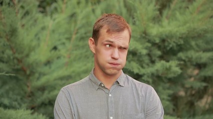 skeptical man rejects offer. man shrugs. disagreement