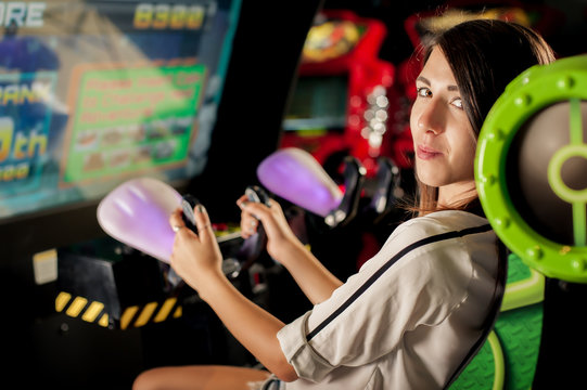 Young woman have fun on the game room
