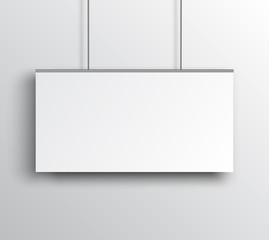 White horizontal poster mockup on grey wall