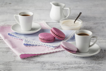 Shabby chic style coffee cup and plate with macaroon cookie