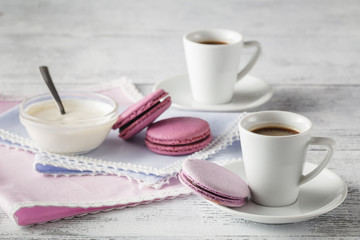 Two Cups of coffee serving on shabby chic background