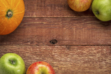 rustic barn wood with pumpkin and apples