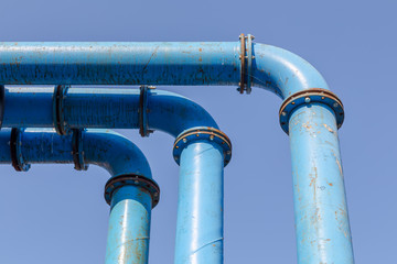 Isolated blue outdoor pipelines.