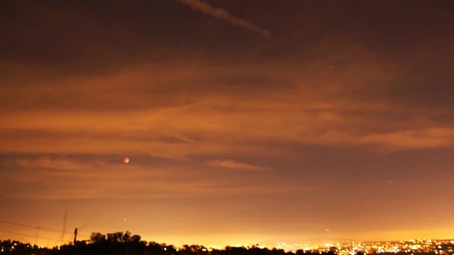 Time Lapse of Lunar Eclipse Rising over Cityscape in LA 2015 Sep -Zoom Out-