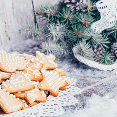 Christmas composition with gingerbread on wooden background