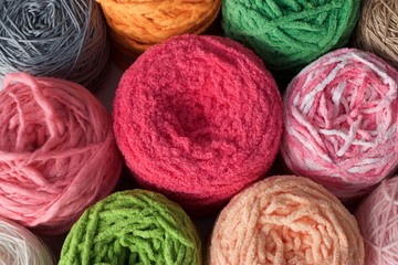 Fototapeta na wymiar Balls of wool cotton silk yarn set top view
