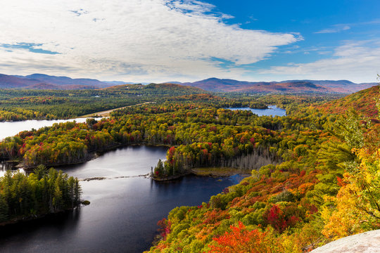 Autumn beginning to take affect on cottage country in the Quebec north. Trees turning blood red before the winter onslaught.