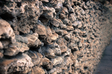 Wall Builded with rocks. Rocky background