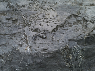 closeup shot of rough grey stone texture background