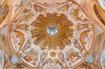 Fototapeta na wymiar BRESCIA, ITALY - MAY 21, 2016: The fresco of cupola with the symbols of cardinal virtues in Chiesa di Santa Maria della Carita by Ferdinando Cairo and Luigi Vernazal from 18. cent.