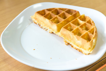 homemade waffle in white dish