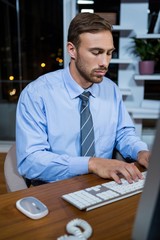Business executive working on computer in office