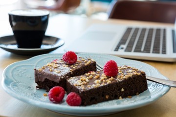 Close-up of delicious cakes with berries topping