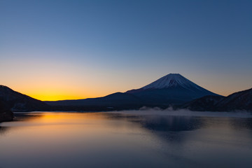 Fototapeta na wymiar Mt.Fuji at Lake Motosu in winter morning