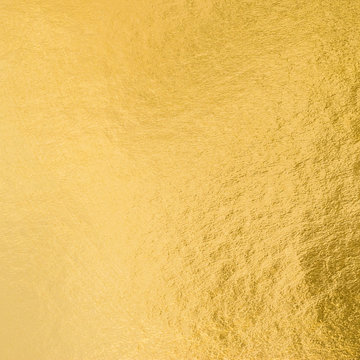 Shiny hot yellow gold golden color decorative texture paper: Bright brilliant festive glossy metallic look textured empty wallpaper backdrop: Aluminium tin metal material for craft design decoration