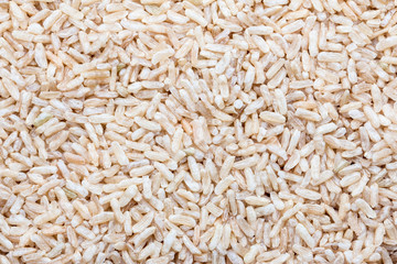 Brown rice uncooked for use as a background.