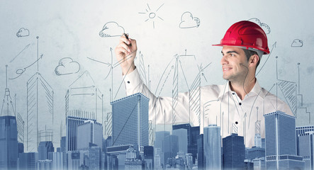 Young worker drawing a city sight
