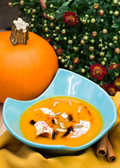Pumpkin soup. Thanksgiving menu. Stuffed whole pumpkin.