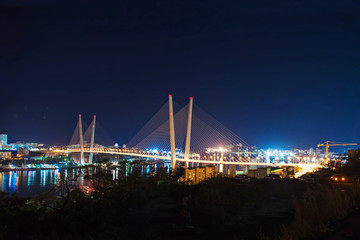 night view of the bridge in the Russian Vladivostok over the Golden Horn bay