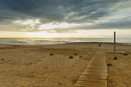 Sunrise on the beach and clouds