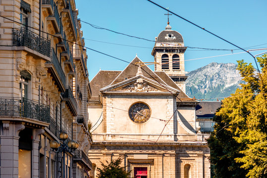 Saint Louis church with bell tower in Grenoble city in France