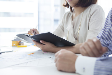 Business people that are eager to listen to the opinion of the boss