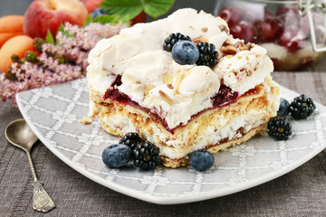 Layer fruit cake with meringue topping