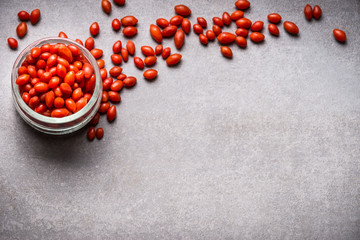 Fresh Goji berries top view, border