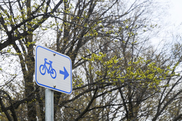 Bicycle signpost in a forest