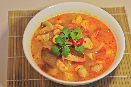 Tom Yum Kung - Hot Spicy Sour Thai herbal soup with prawn