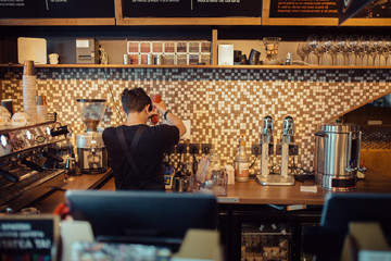 Barista at work in a coffee shop