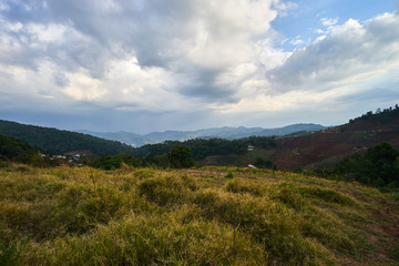 Fototapeta premium Mountain terrain with cloudy sky