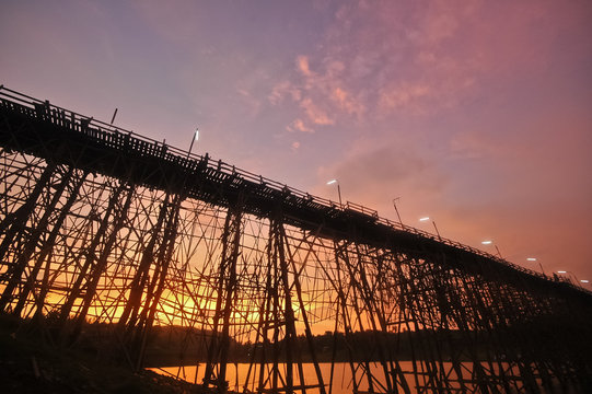 Silhouette scene of the twilight great bamboo bridge in Sangkhla